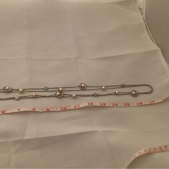 Long gold tone and silver tone metallic necklace - Picture 6 of 6